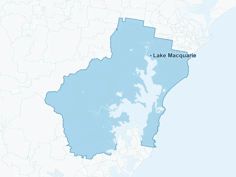 Map highlighting selected suburbs in Lake Macquarie, including Cardiff, Charlestown, Belmont, Toronto, with collection subject to address availability.